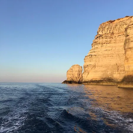 B H * Lampedusa